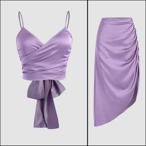 Brand NEW with tags stretchy silky set. Solid